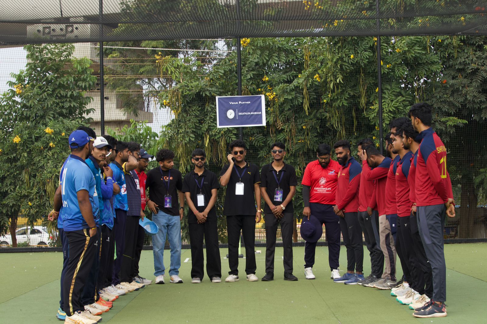 Opening ceremony with teams lined up under lights