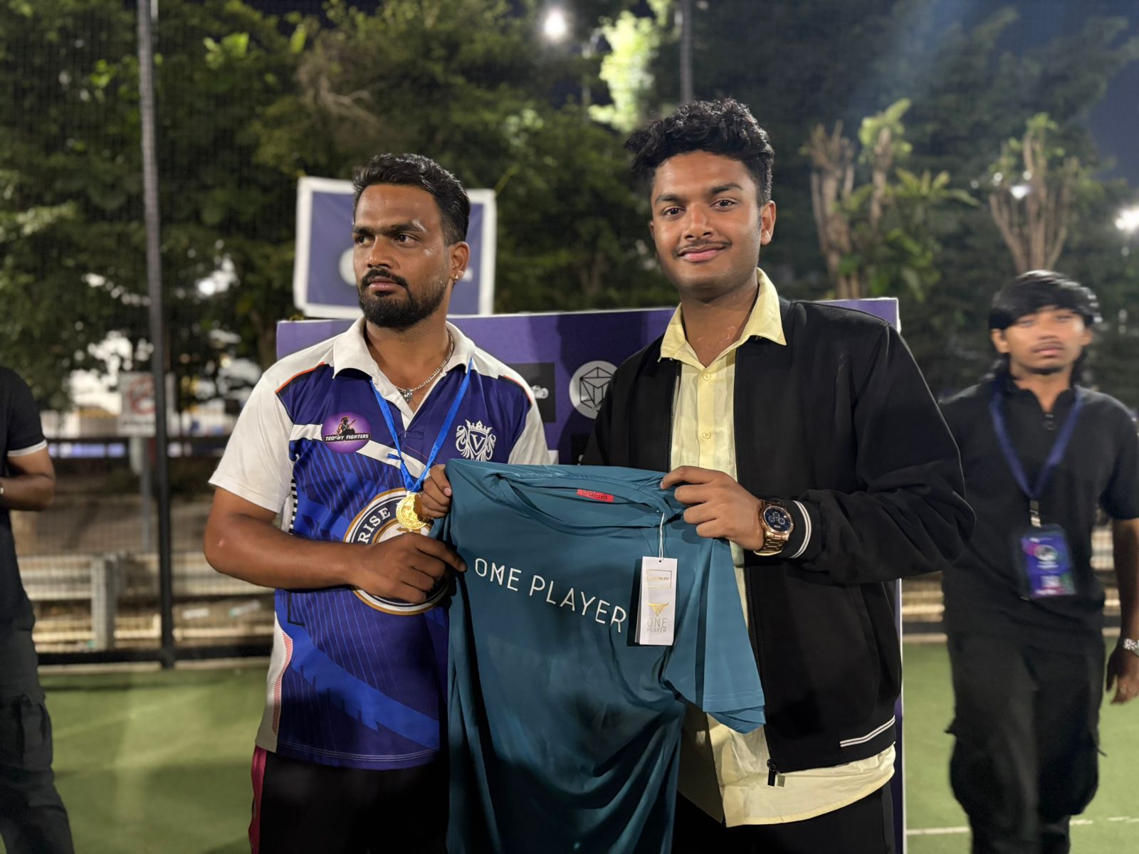 Champions lifting the BSSL trophy amid fireworks